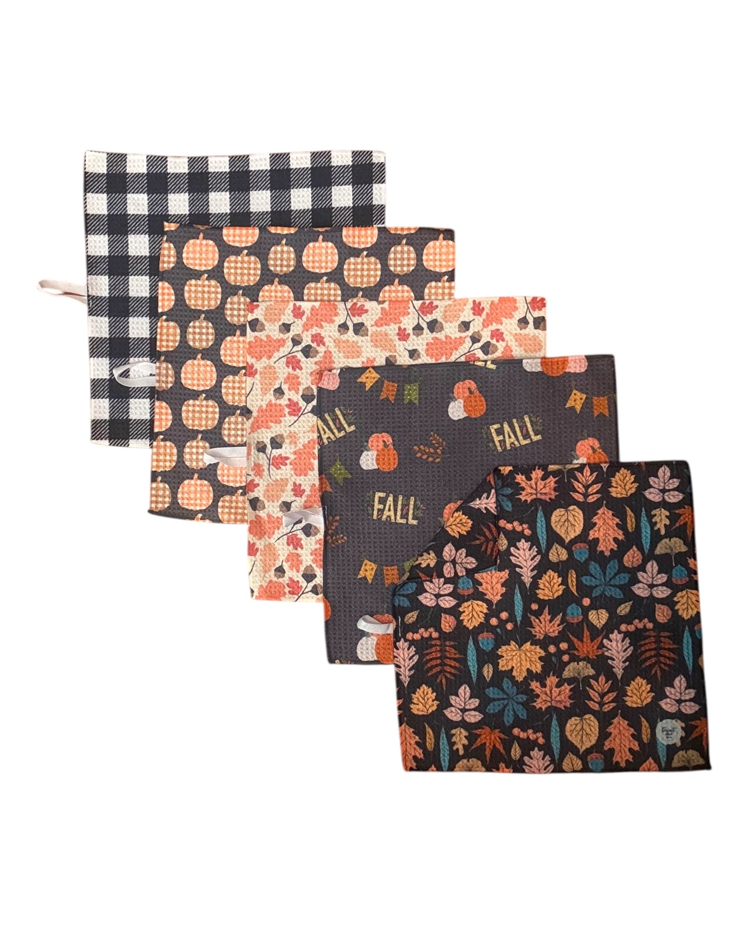 Set of five fall-themed wash cloths with various patterns on a white background