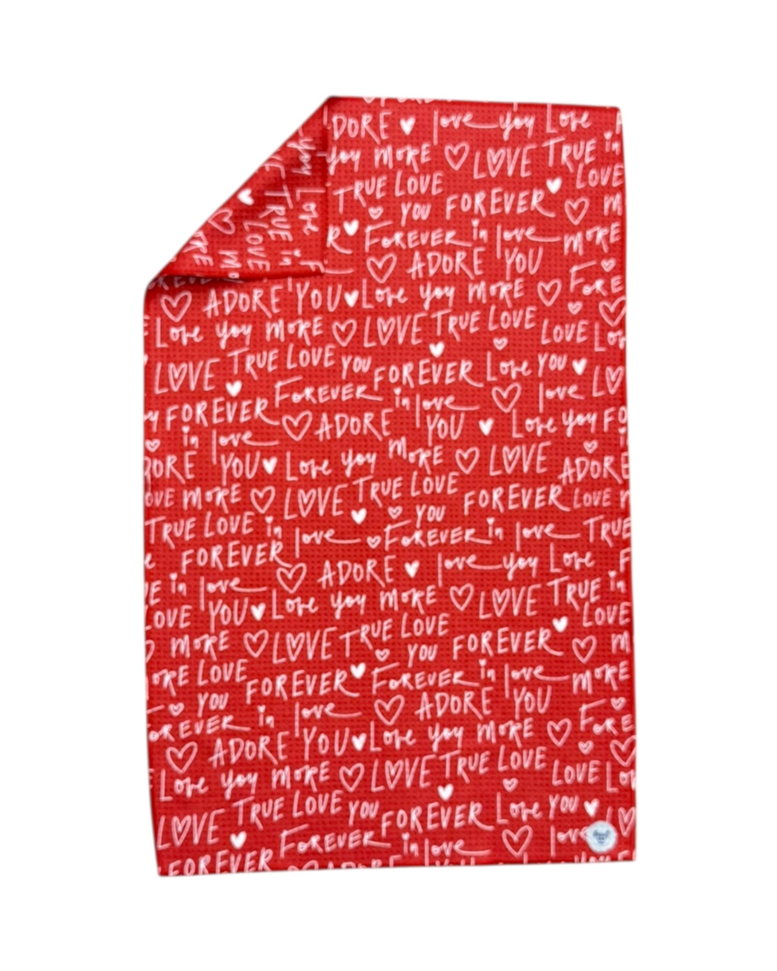 Red DISH TOWEL with white text and heart patterns on a white background