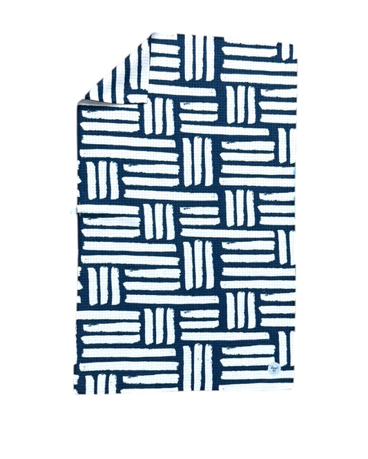 Textile with blue and white geometric pattern on a white background