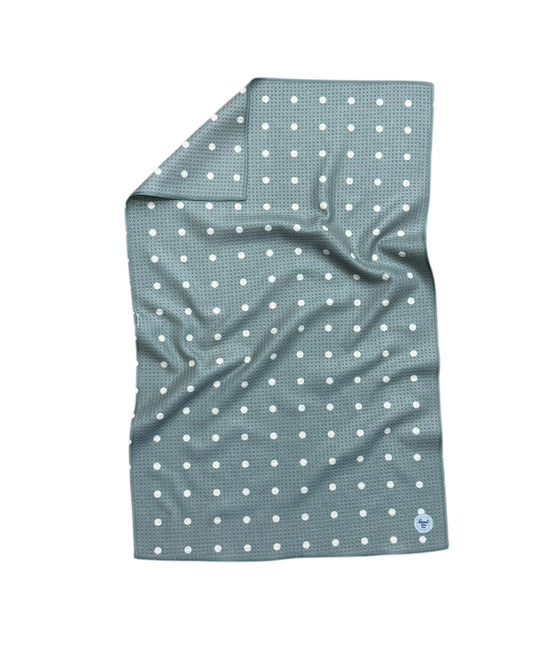 GREEN polka dot TOWEL on a white background